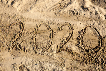 Happy new year. 2020  on sand beach
