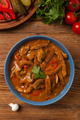 Boeuf, Stroganow, Strogonow. Classic, Russian beef stew. Served in a blue bowl. Top view. Natural...
