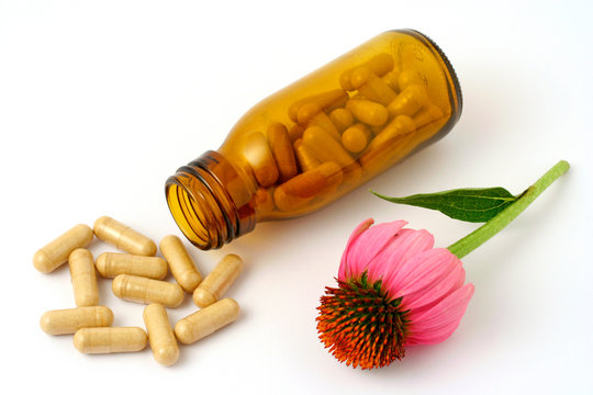 Coneflower and pills. (Echinacea purpurea)