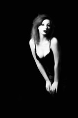 Beautiful Young woman as sexy vampire halloween portrait