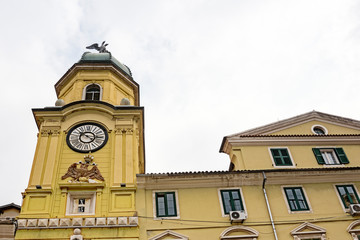 Fototapeta na wymiar yellow City tower with clock, called Gradski Toranj, in Rijeka, Croatia