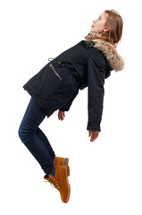 Side view of a woman dancing ballet. The girl is balancing. © ghoststone