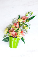 Flowers in garden bucket