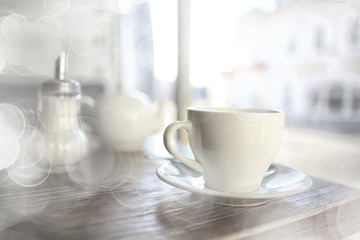 cup in an outdoor cafe / breakfast concept in a cafe, coffee, tea, morning drink
