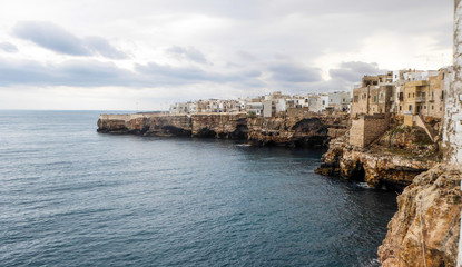 Panoramic city skyline with white houses of Polignano a Mare, town on the rocks, Italian town of the metropolitan city of Bari in Puglia region, Italy.