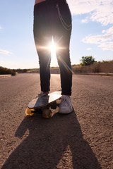 portrait of a teenager skater girl at the city