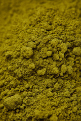 Obraz premium selective focus of dark green matcha powder