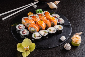 sushi on the black background