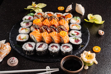 sushi on the black background