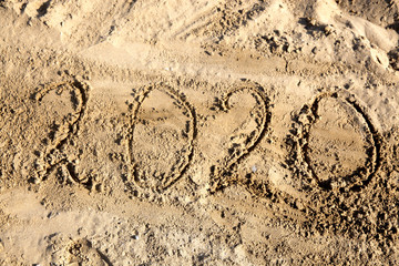 Happy new year. 2020  on sand beach
