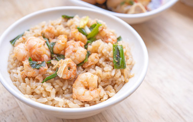 Braised shrimp over rice - Taiwan famous traditional street food. Soy-stewed prawn on cooked rice. Travel concept, top view, copy space, close up