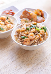 Braised shrimp over rice - Taiwan famous traditional street food. Soy-stewed prawn on cooked rice. Travel concept, top view, copy space, close up