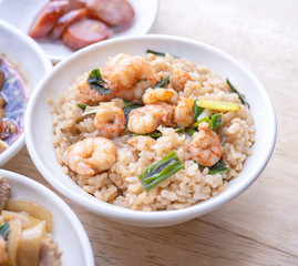 Braised shrimp over rice - Taiwan famous traditional street food. Soy-stewed prawn on cooked rice. Travel concept, top view, copy space, close up