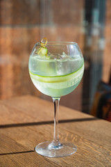 summer cocktal with cucumber and lemon