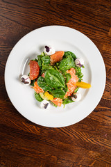 caesar salad with salmon fish