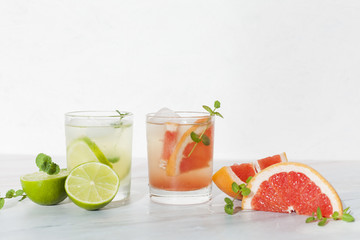 Cool citrus beverages on table