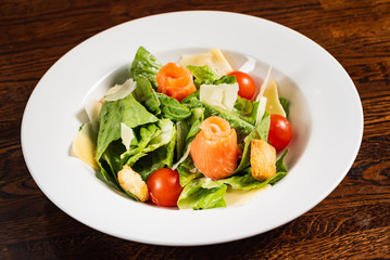 caesar salad with salmon fish