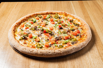 tasty pizza on the wooden table