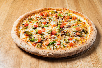 tasty pizza on the wooden table