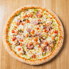 italian pizza on the wooden background