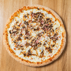 italian pizza on the wooden background