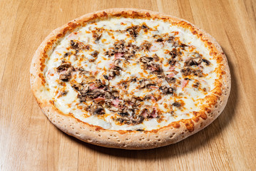 italian pizza on the wooden background