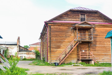 lesosibirsk / Russia - june 06 2019: old wooden houses with carved Windows. Small town. Village