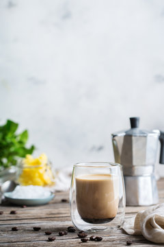 Keto, ketogenic bulletproof coffee with coconut oil and ghee butter