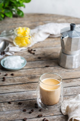 Keto, ketogenic bulletproof coffee with coconut oil and ghee butter