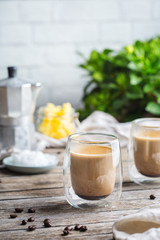 Keto, ketogenic bulletproof coffee with coconut oil and ghee butter