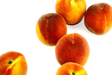 In the photo are fresh and juicy peaches, bright and rich, red, yellow