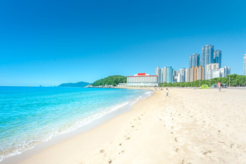 sea beach blue sky sand sun daylight relaxation landscape viewpoint in Haeundae beach in summer at Busan in Korea.