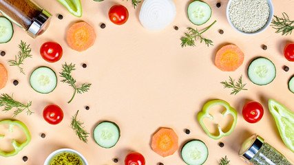 Salad ingredients layout. Food pattern with cherry tomatoes, carrot, cucumbers, radish, greens, pepper and spices