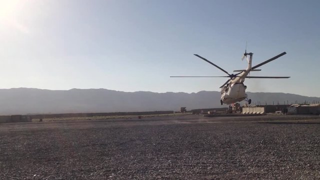 Civilian helicopters assist troop movement in southern Afghanistan.