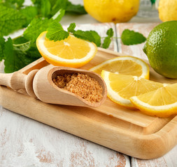 yellow lemons and lime, brown sugar and fresh mint