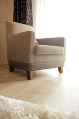 Fototapeta na wymiar Modern and elegant armchair in the interior