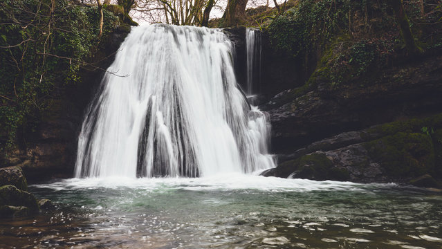 A waterfall at Janet's Foss near Malham in the Yorkshire Dales, England.