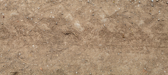 Brownish Dirt Road Texture With Tractor Wheel Embossed