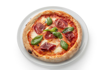 Pepperoni pizza with spinach and bacon on a white plate.
