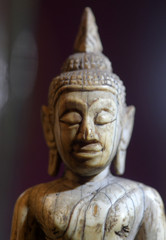 The face of the ancient Buddha image in the temple