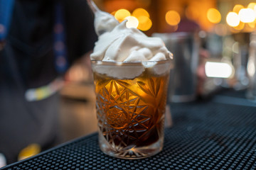 Affogato, Italian coffee-based dessert with vanilla ice cream topped or drowned with a shot of hot espresso. Some variations also include a shot of amaretto