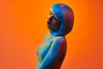 Dreamy futuristic lady looking away