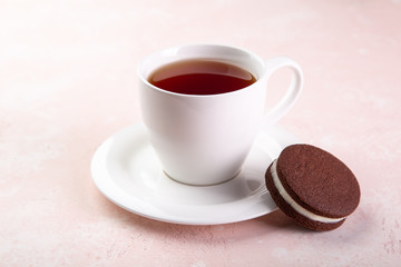 cup of tea and homemade chocolate sandwich cookies