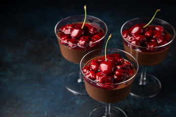 chocolate Panna Cotta dessert with sweet cherry