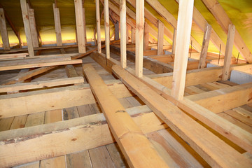 Roofing Construction Attic Insulation Interior. Wooden Roof Beams, Roof Truuses,  Frame House Attic Construction.