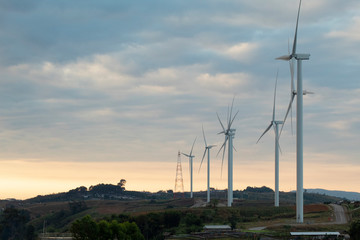 wind turbines at sunset