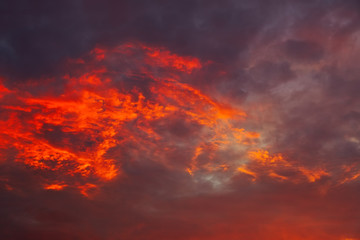 Beautiful fiery, orange and red, sunset sky. Evening Magic Scene. Composition of nature