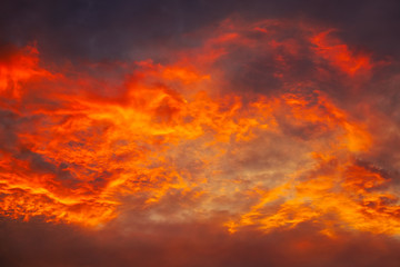 Fototapeta na wymiar Beautiful fiery, orange and red, sunset sky. Evening Magic Scene. Composition of nature