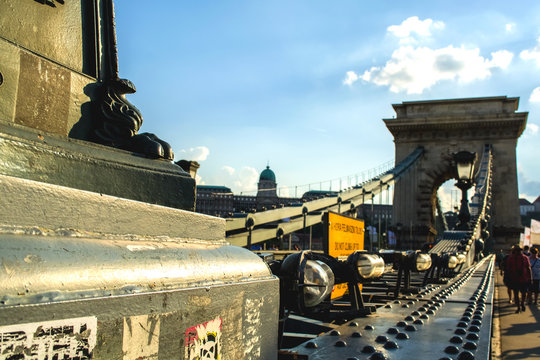 12.06.2019. Budapest, Hungary. A look on old the Chain Secheni Bridge and on an environment around it. The tourist place in Europe in the evening.