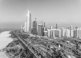 Gordijnen Uitzicht op de binnenstad van Abu Dhabi vanuit een helikopter © jovannig